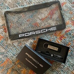 Brand New PORSCHE logo plate frame with logo keyring and pen and gift box